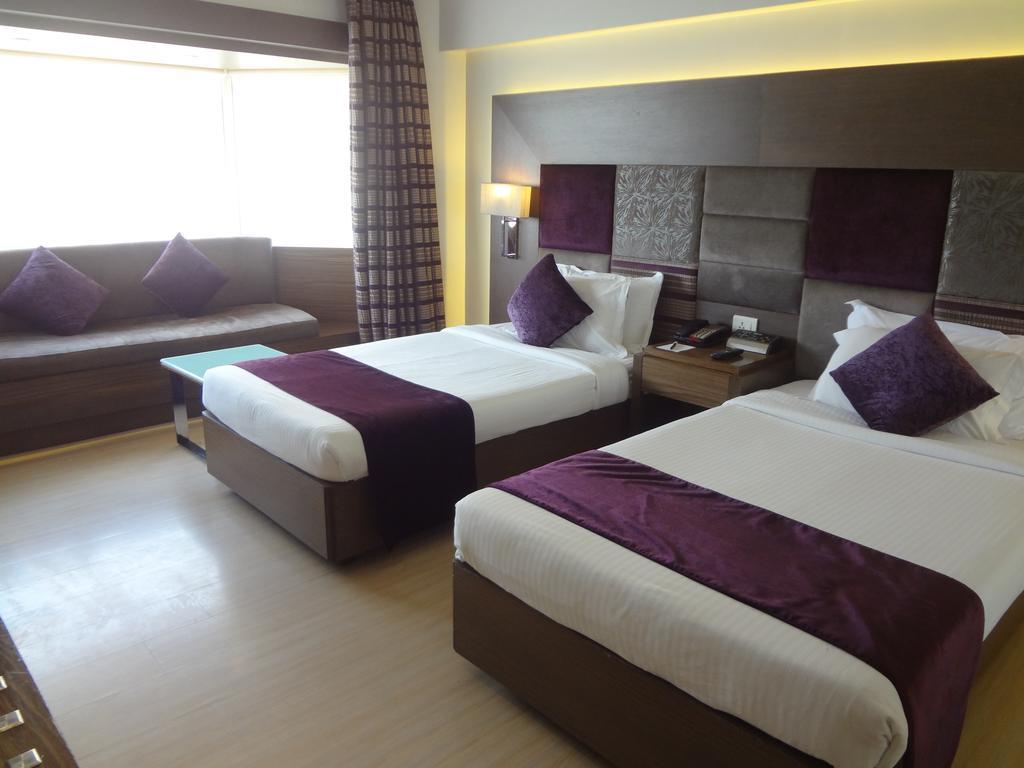 Hotel Sea Princess Мумбаи Номер фото